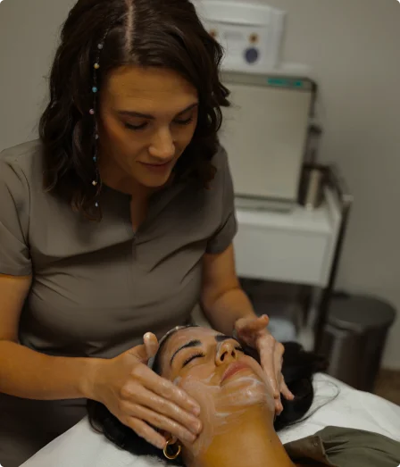 morgan providing facial treatment services